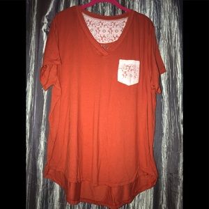 Rust color v neck shirt with lace detail pocket